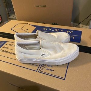 Canvas white slip on vans
